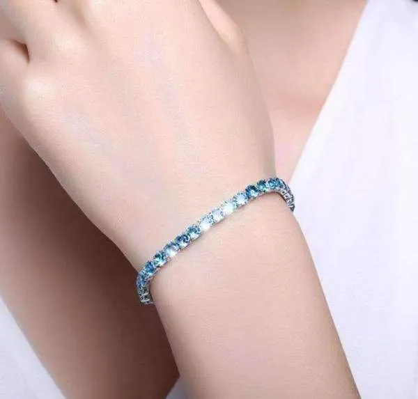 Sterling Silver Blue Aquamarine Oval Cut Petite Tennis Bracelet